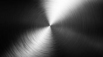 A circular pattern of concentric lines on a metallic surface photo