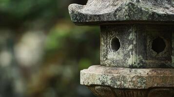 Weathered Stone Lantern with Circular Openings photo
