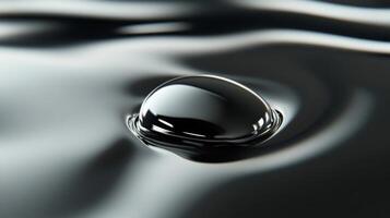 A Single Drop of Liquid Mercury Resting on a Smooth Surface photo