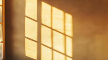 Window Light Casting a Grid Pattern on a Beige Wall photo
