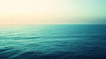 Expansive Ocean Horizon with a Hazy Sky photo