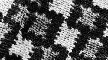 Close-up of Black and White Wool Fabric with a Checkered Pattern photo