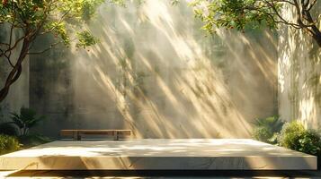 Soft neutral background with shadows of trees falling across a beige wall sunlight hitting a concrete platform creating a peaceful and aesthetic scene for product display photo