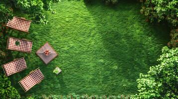 Top down view of park picnic area with folding lawn chairs and a checkered blanket on the grass white isolated background photo