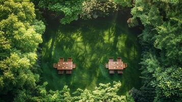 Top down view of beautiful park with linedup lawn chairs and a picnic table perfect for an outdoor gathering white isolated background photo