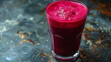 Vibrant Beetroot Juice a Clear Glass A striking glass of beetroot juice rich in color and nutrients presented against a simple clean background photo