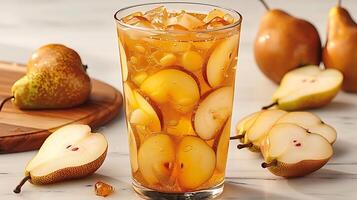 Tall Glass of Refreshing Pear Juice Pear Slices A light and sweet pear juice served tall showcasing fresh pear slices for added flavor photo