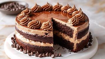 Rich and indulgent chocolate peanut butter cake cut out on an isolated simple minimalist background photo