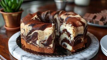 Classic marble cake with swirls of chocolate and vanilla cut out on an isolated simple minimalist background photo