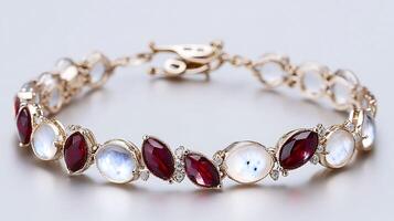Charming moonstone and spinel bracelet with translucent moonstones and red spinel stones arranged in a delicate design photo