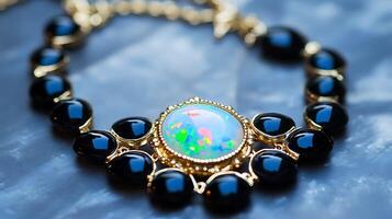 Charming opal and onyx necklace with a mesmerizing opal and deep black onyx stones in a classic design photo