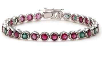 Luxurious ruby and emerald bracelet featuring alternating red and green gemstones in a sleek design photo