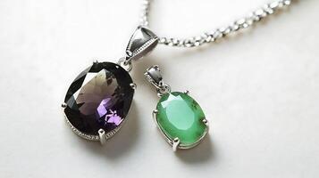 Sophisticated alexandrite and chrysoprase pendant with a colorchanging alexandrite stone and a bright green chrysoprase set in a silver chain photo