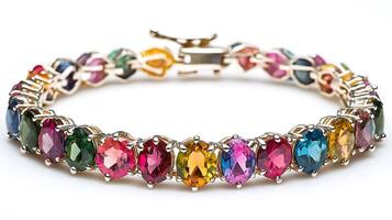 Vibrant tourmaline bracelet with multicolored gemstones arranged in a playful yet sophisticated pattern photo