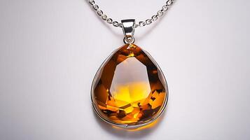 Warm amber pendant with a golden gemstone set in a simple yet elegant silver chain photo