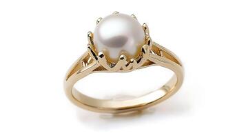Exquisite pearl ring with a lustrous white pearl set in a delicate gold band ideal for timeless elegance photo