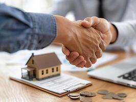 Close-up of landlord and customer finalizing rental contract, professional setting with documents, photo