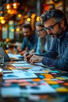 Creative team working on a business plan, with ideas and sketches on sticky notes covering the table. photo