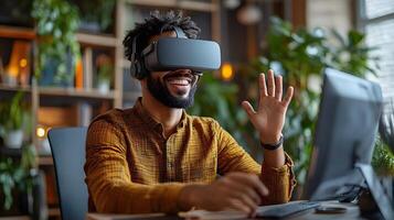 A businessman with a cheerful expression wearing virtual reality goggles, sitting at his desk in a modern office, making creative hand gestures. photo