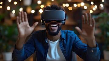 Happy businessman seated at a desk, exploring a virtual environment through VR goggles, making expressive poses as he interacts with the unseen. photo