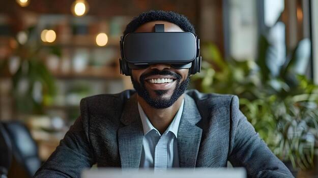 Man in a business suit, smiling as he uses virtual reality goggles at his desk, engaging in imaginative poses while immersed in a digital world. photo