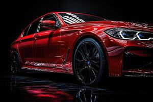 Red sports car parked on black background with copy space photo