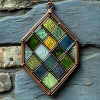 Modern stained glass window displaying geometric green pattern photo