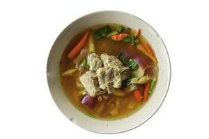 Spicy spare rib pork with pork and vegetable in bowl on whitebackground isoletion,clipping path. photo