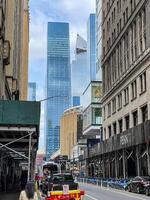 The edge in the background is a tall skyscraper in New York city. photo