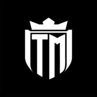 TM Letter logo shield shape inside shield badge crown on black background template design vector