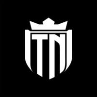 TN Letter logo shield shape inside shield badge crown on black background template design vector
