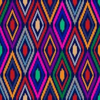 Ikat geometric folklore ornament with diamonds colorful color. vector