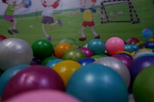 Modern kid's playground with slide and balls indoor photo