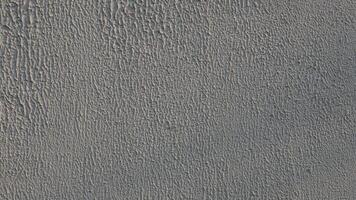 Concrete grey wall texture may used as background photo