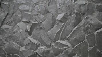 Grey rock stone texture background wall pattern, top view. Background design for dark wallpaper. photo