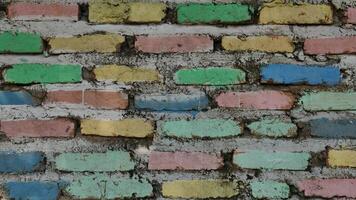 color brick wall, multi-colored masonry. rainbow background photo