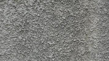 Concrete grey wall texture may used as background photo