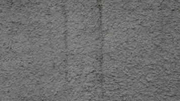 Concrete grey wall texture may used as background photo