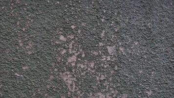 Concrete grey wall texture may used as background photo
