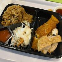 This bento box is a beautiful way to enjoy a variety of Japanese dishes photo