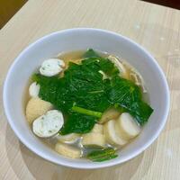 Warm up with a bowl of seafood soup, brimming with fresh flavors and ocean goodness photo
