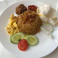 Nasi goreng is the perfect blend of flavors and spices, comfort food at its finest photo