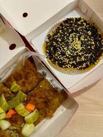 Savoring the best of both worlds with Indonesian thick folded crepe that is sweet and savory photo
