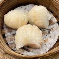 Steam Har Gow. Delicate, translucent har gow - a dim sum classic, filled with succulent shrimp wrapped in a tender rice flour skin photo