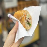 Crunchy, savory, and packed with flavor, this banh mi is a little slice of heaven photo
