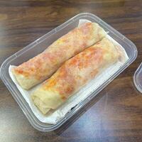 Rolling into a world of flavor with these delicious rice paper rolls. Perfectly packed with fresh ingredients photo