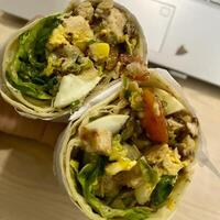 Fresh, crisp, and wrapped with love, this salad wrap is the ultimate bite of goodness photo