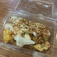Delighting in the fluffy goodness of ci cong fan. Soft, savory rice rolls that are perfect for dipping photo
