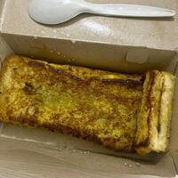 Golden, crispy, and delicious. Enjoying the sweet bliss of Roti Bakar Bandung photo