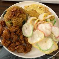 Savoring every bite of this delicious Indonesian fried rice photo